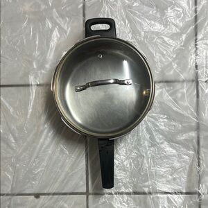 Stainless Steel Cookware with Black Handle 10 inches wide 3.5 inches deep